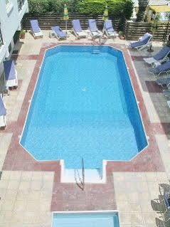 Renos Hotel Apts Polis Bagian luar foto