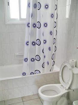 Renos Hotel Apts Polis Bagian luar foto